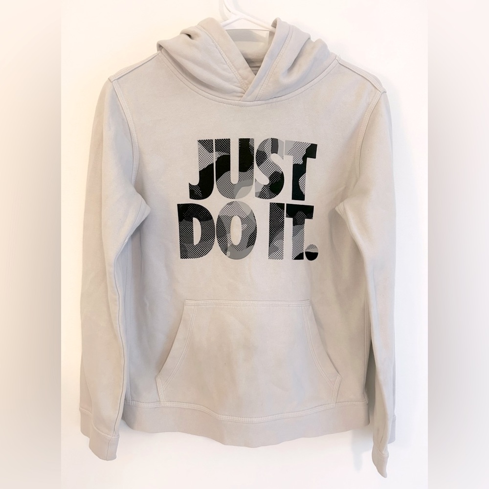 Nike Hoodie! Off white color, with Just Do It print in black camo. Size Youth XL